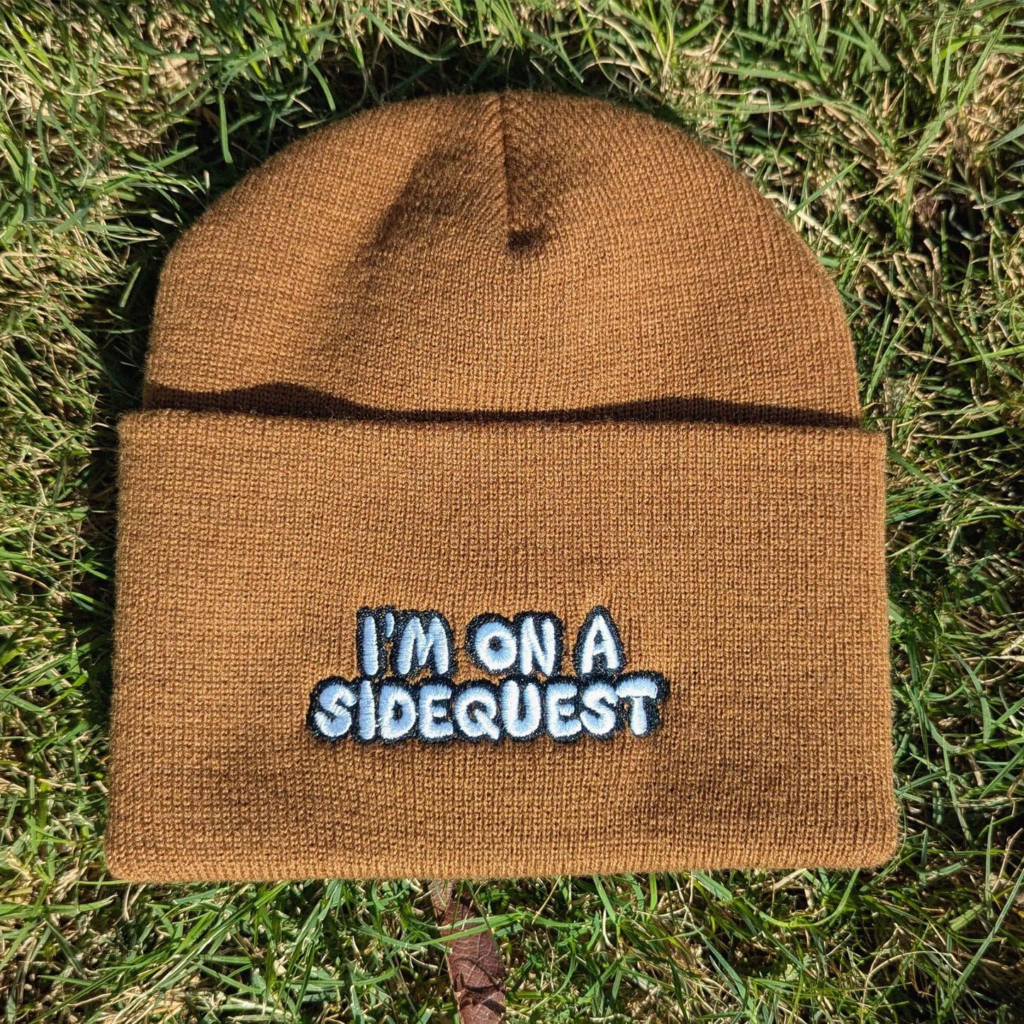 Brown "I'm on a sidequest" beanie, perfect for raves and gamers.
