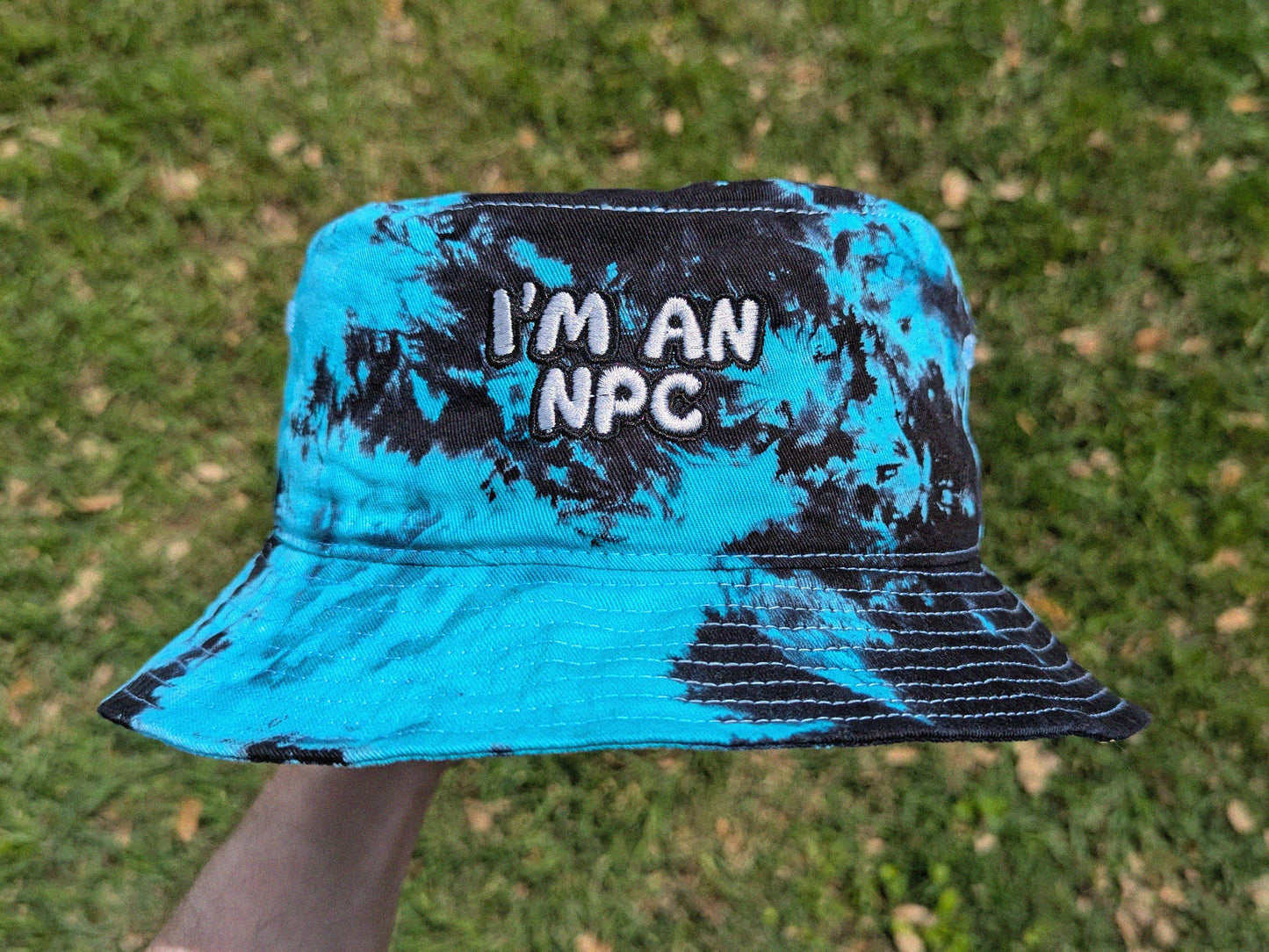 I'm an NPC - Embroidered Tie Dye Bucket Hat - Rave Outfit Accessory, Music Festival Gear, Funny EDM Raver Hat, Festival Gift Party Hat