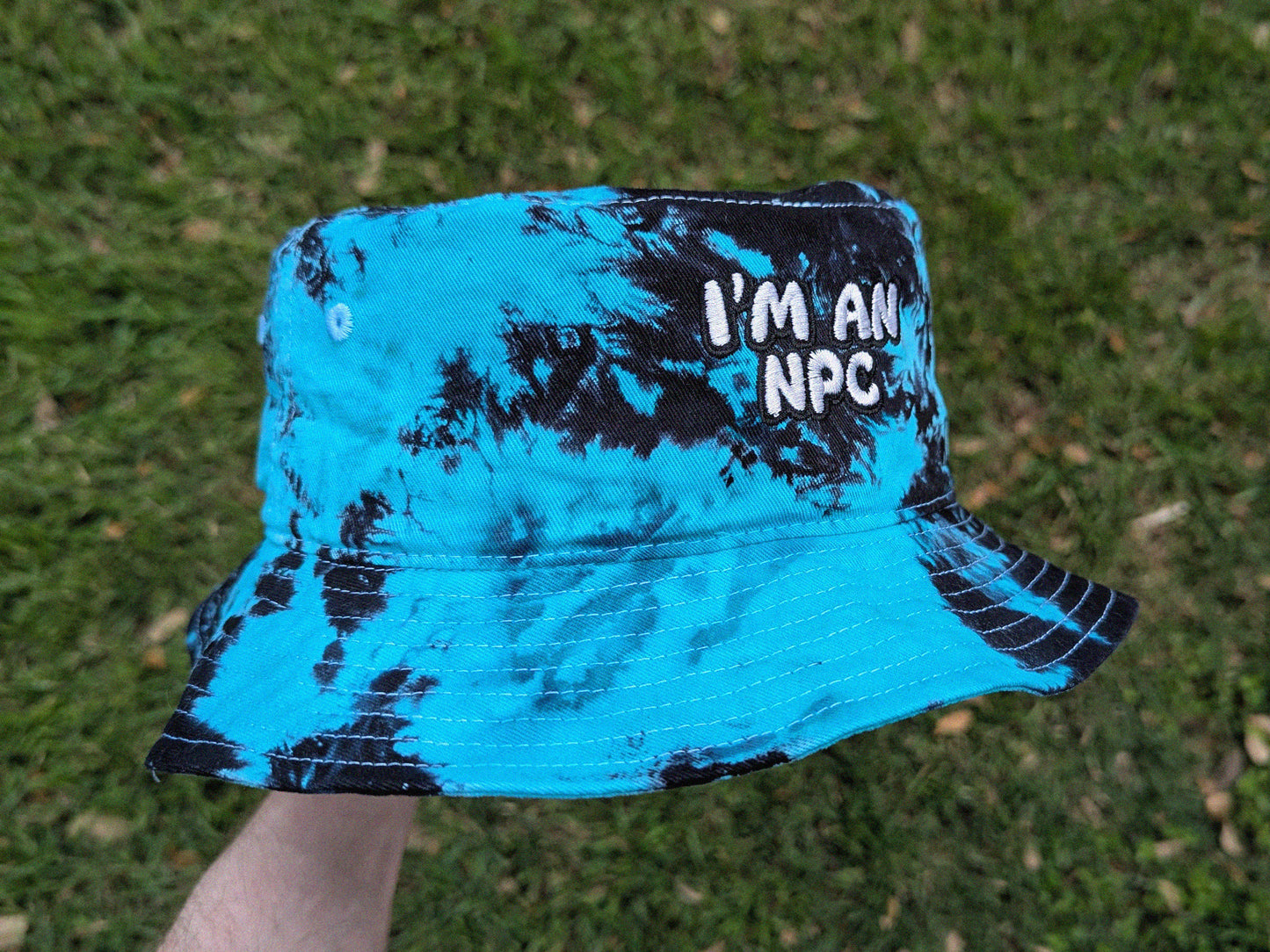 I'm an NPC - Embroidered Tie Dye Bucket Hat - Rave Outfit Accessory, Music Festival Gear, Funny EDM Raver Hat, Festival Gift Party Hat