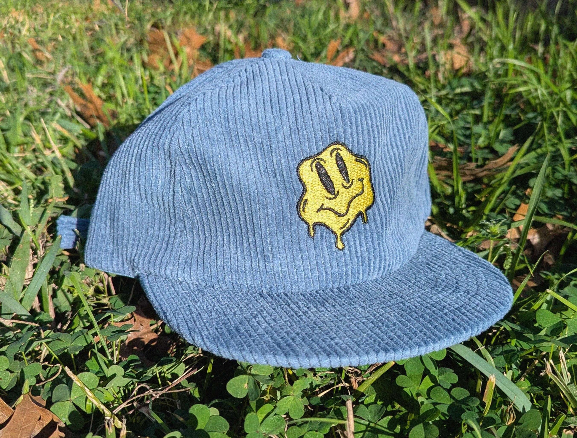 Psychedelic melting smile rave cap