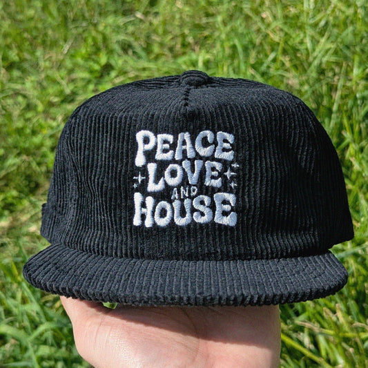 Black rave corduroy cap with 'Peace Love and House' embroidery