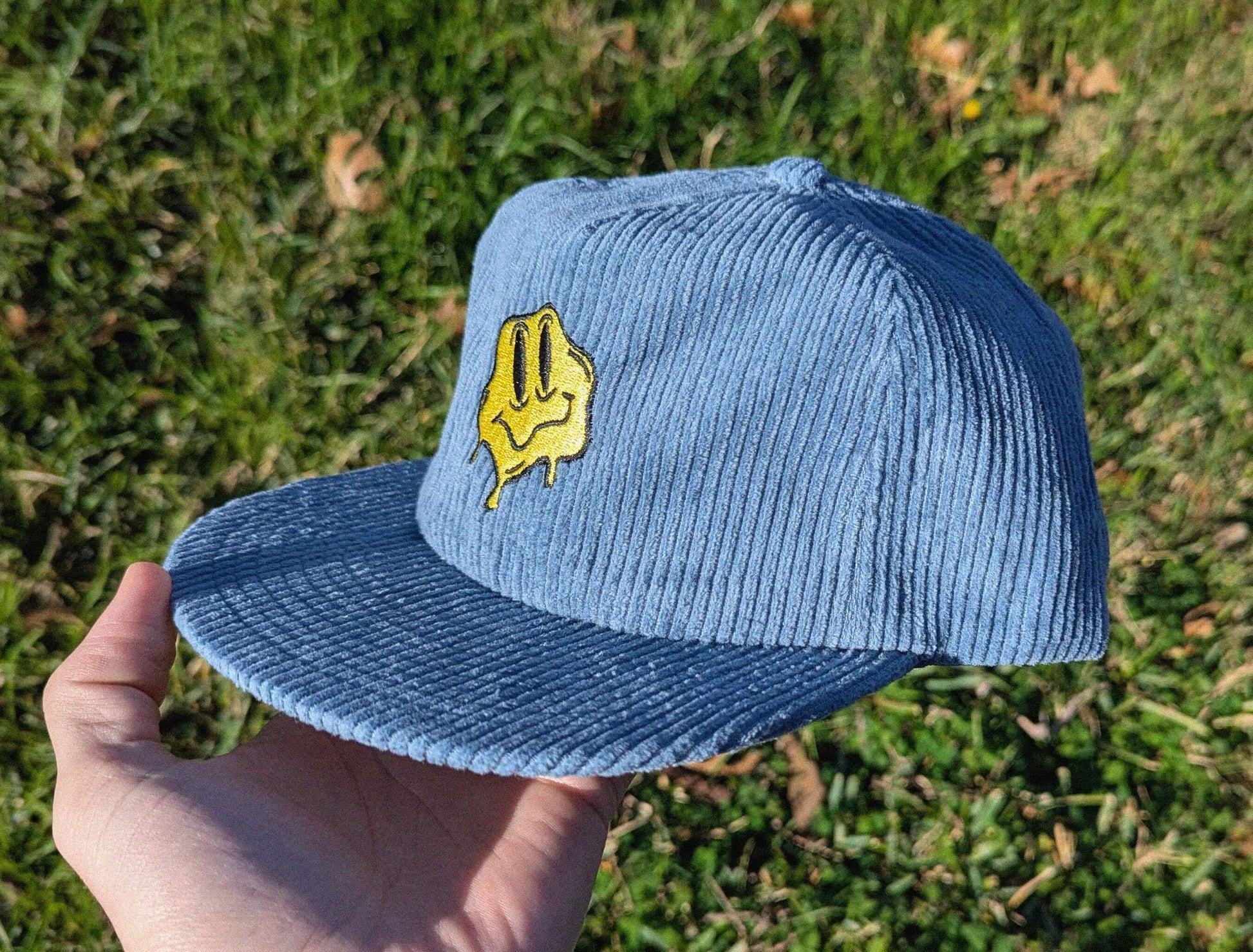 Trippy melting smile EDM festival hat