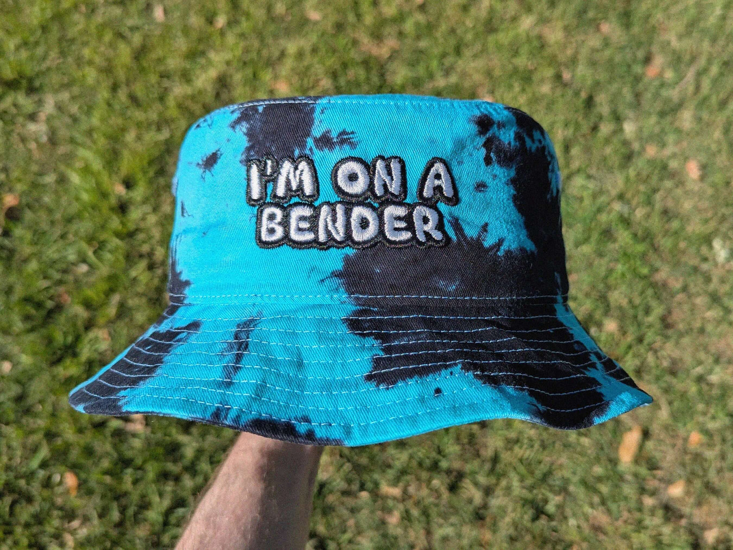 Teal and black tie dye bucket hat I'm On A Bender embroidered rave festival headwear
