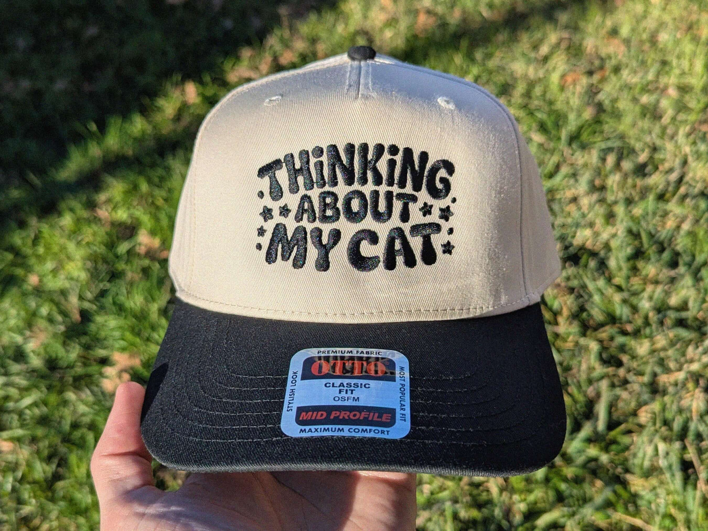 Cat lover thinking about my cat embroidered trucker hat for music festivals
