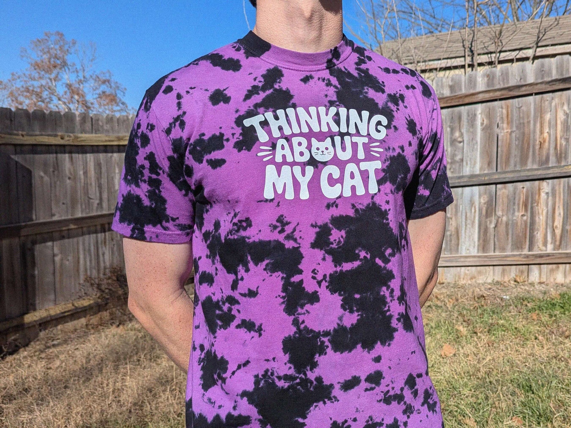 Purple and black tie dye rave shirt with Thinking About My Cat graphic design