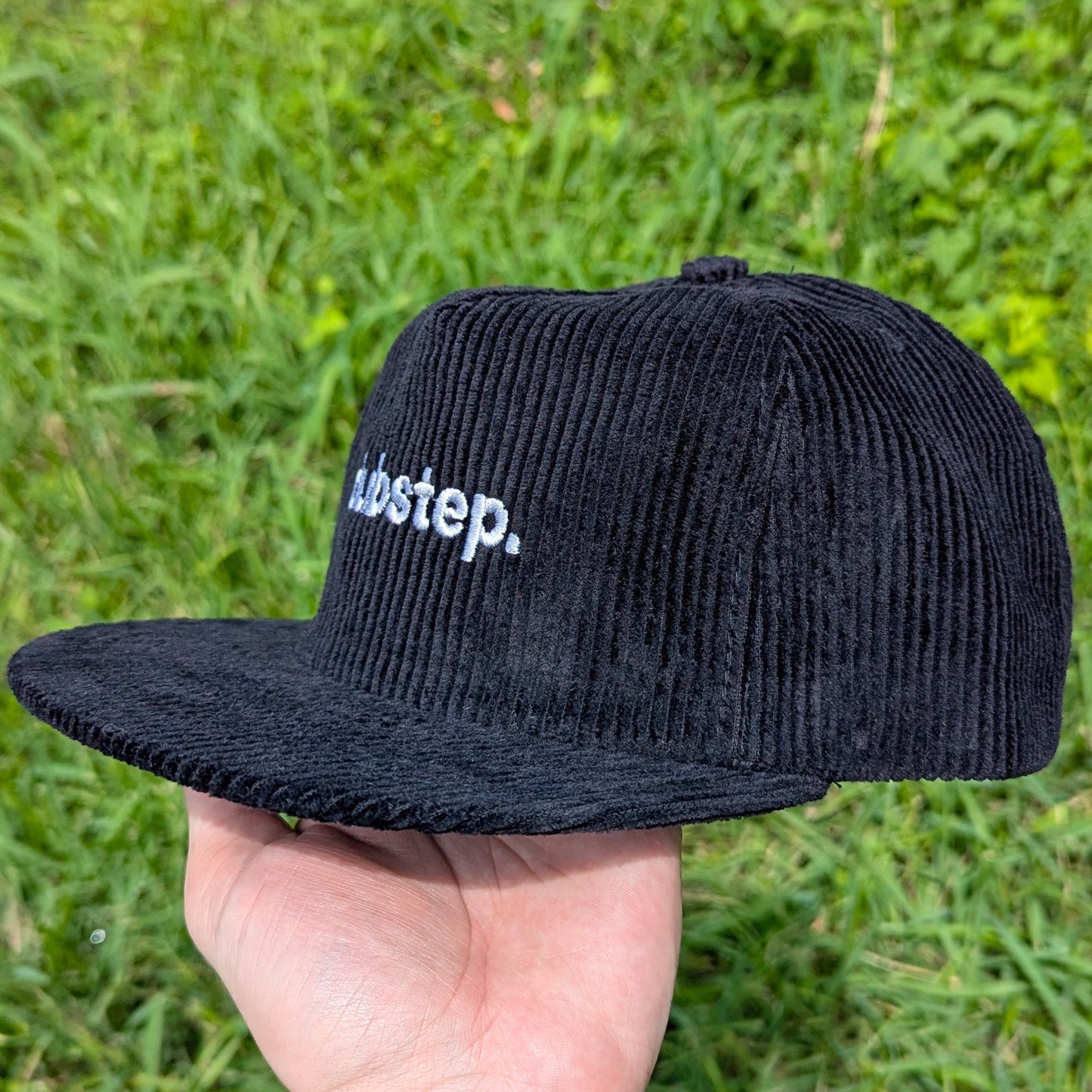 Black corduroy rave hat with 'dubstep.' embroidery