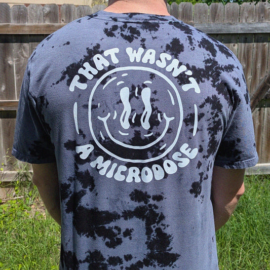 tie-dye t-shirt with 'That wasn't a microdose' screen printed on the back