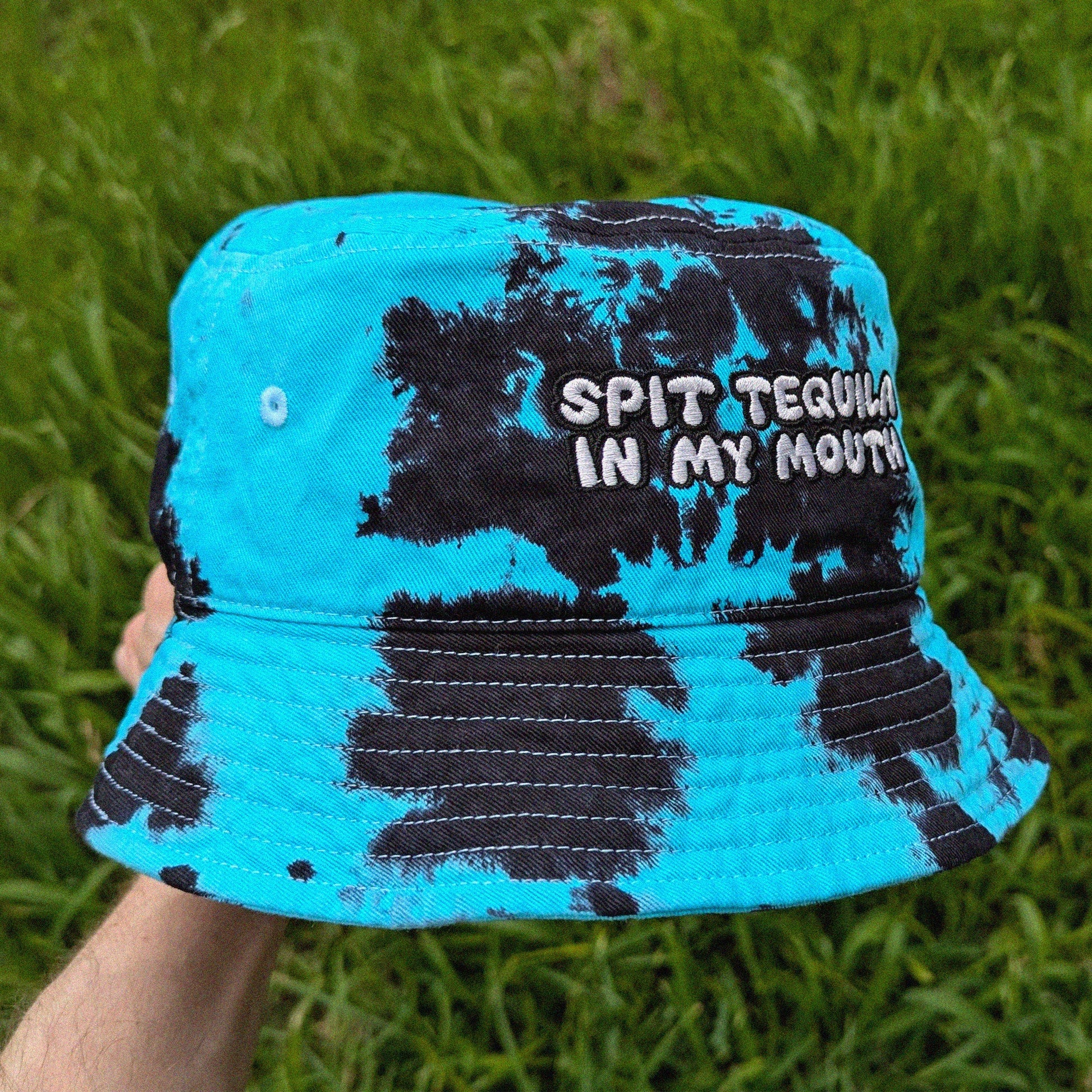 Funny festival bucket hat with 'Spit tequila in my mouth' text