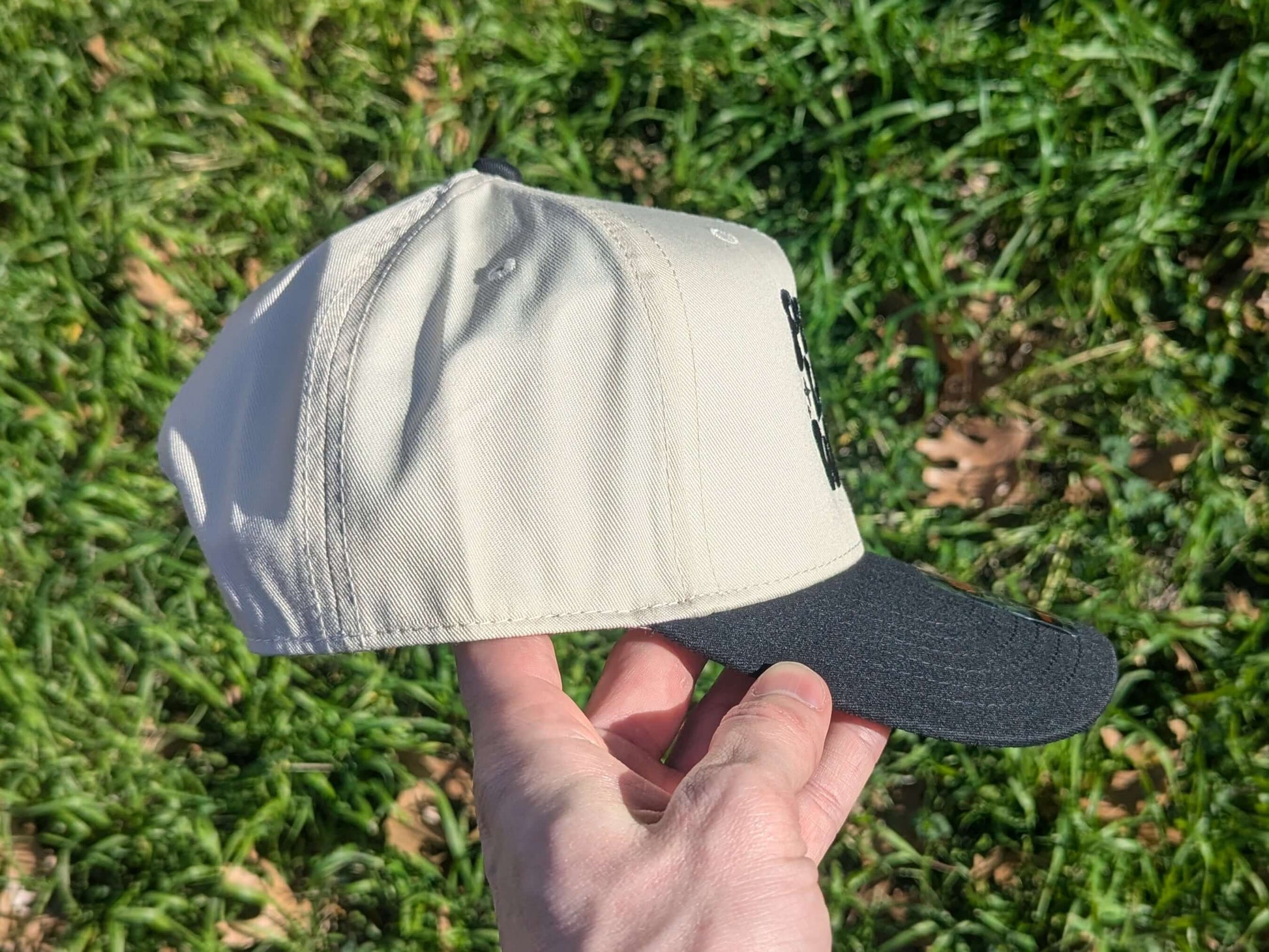 Peace love and wubz bass music rave trucker hat festival accessories side view