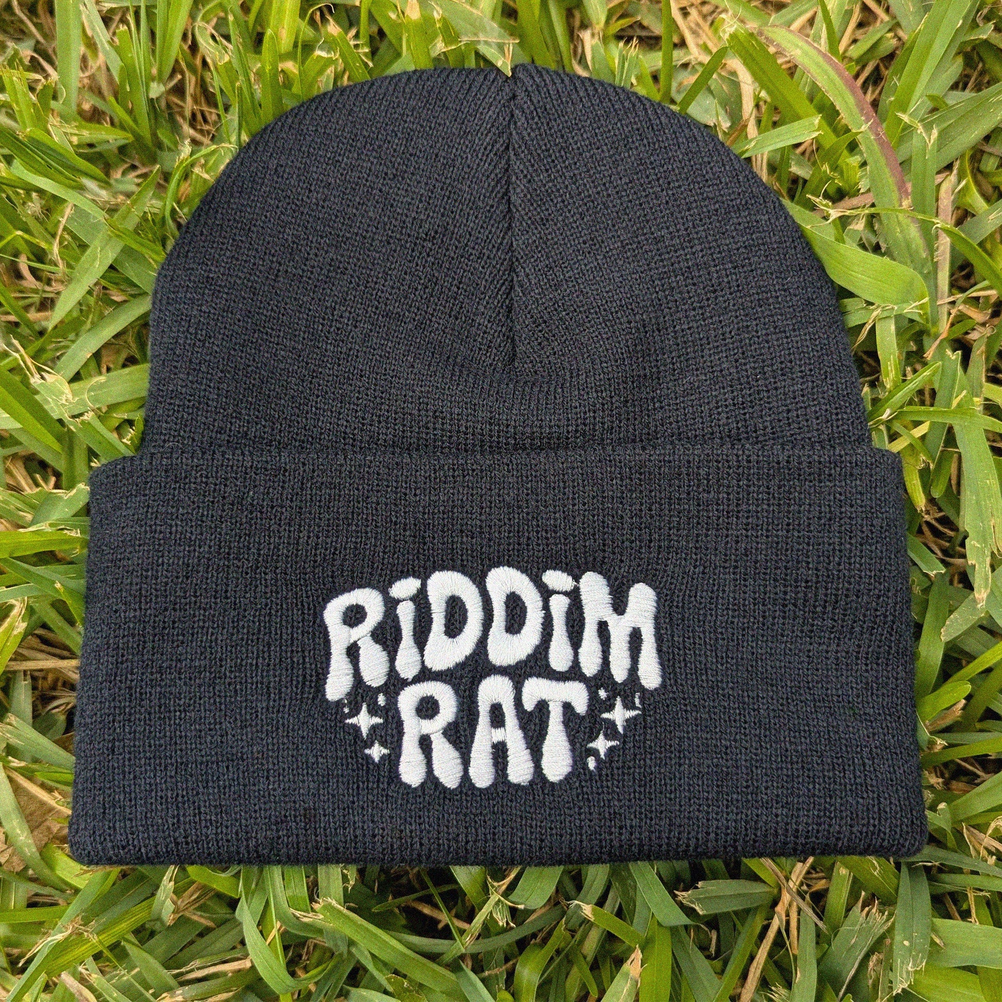 Black beanie with 'Riddim Rat' text
