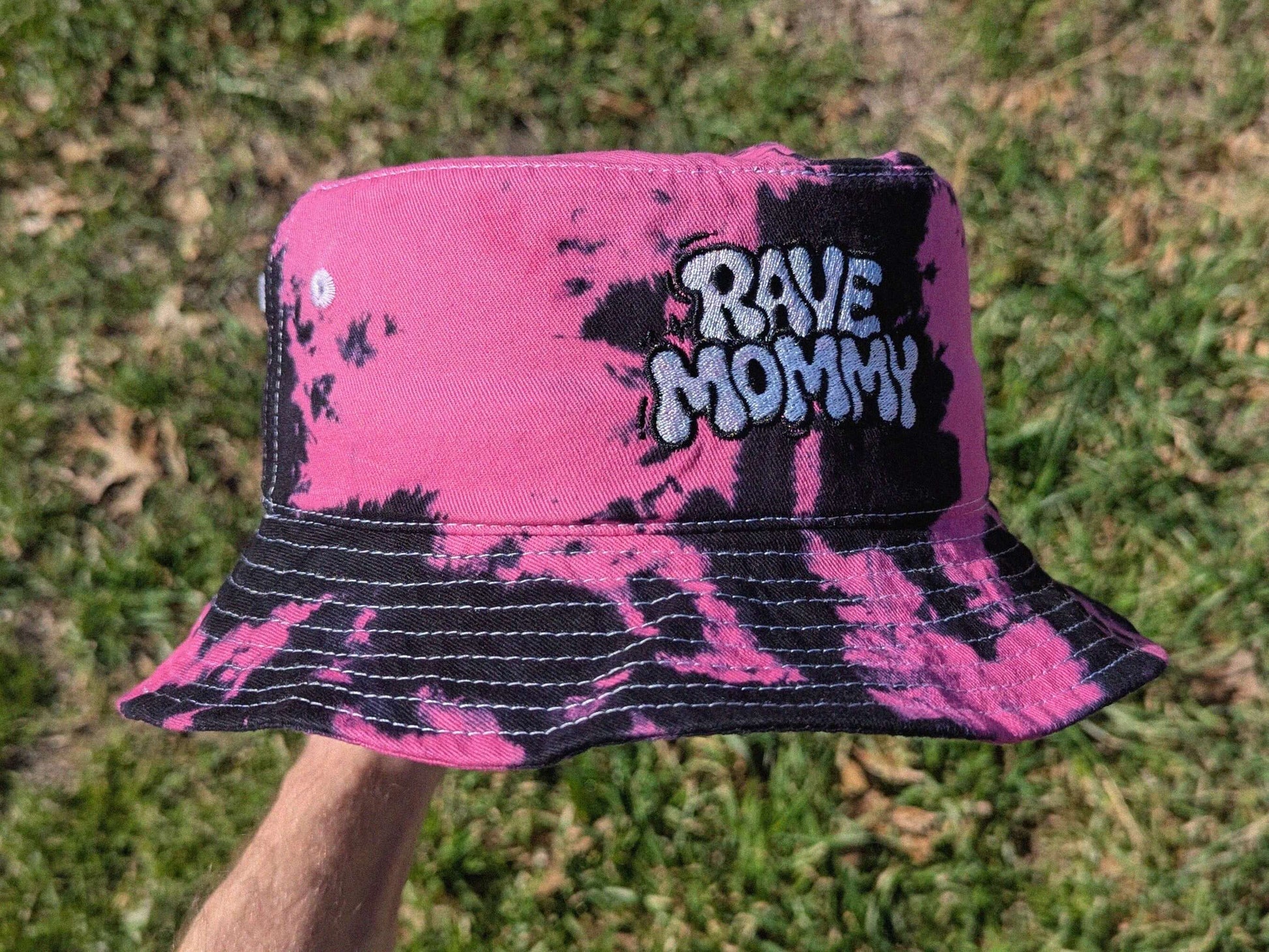 side view of tie dye bucket hat for "rave mommy" hat, made for ravers and music festival attendees